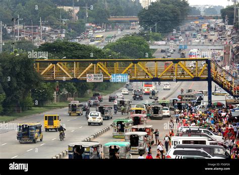 Traffic On Commonwealth Avenue Connecting Quezon City And Manila The