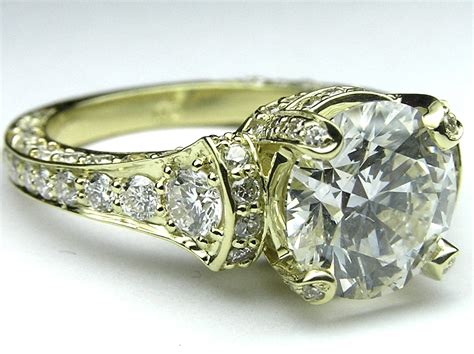 Whether she desires a unique solitaire, or a diamond embellished shank. Engagement Ring -Large Graduated Diamonds Engagement Ring 14K Yellow Gold-ES745BRYG