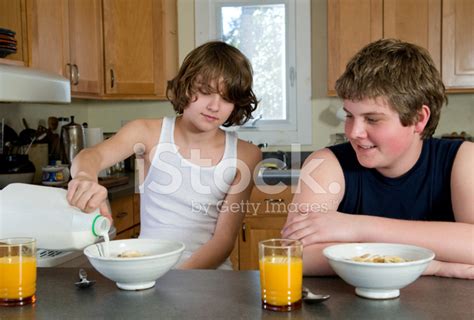 Boys Having Breakfast Stock Photos