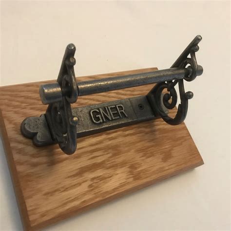 Cast iron GNER Toilet roll holder on oak plaque | Toilet roll holder, Roll holder, Toilet roll