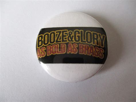 booze and glory as bold as brass punk badge savage amusement