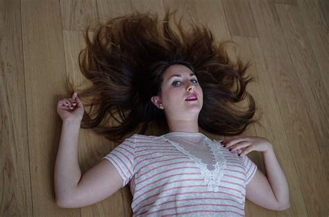 spread hair on a parquet floor behance