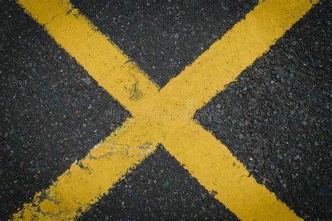 Yellow X Crossing Sign Painted On The Road Asphalt Stock Photo Image