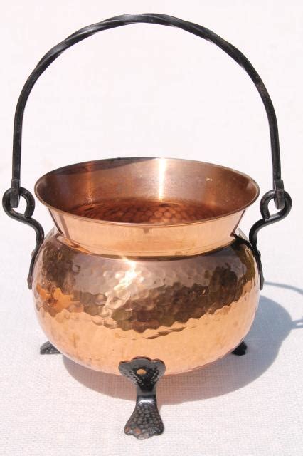 The witch's cauldron is a machine from witchery. vintage Swiss copper pot kettle w/ wrought iron handle ...