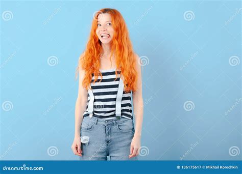 Redhead Girl Shows Tongue And Smiles Stock Image Image Of Female Expression 136175617