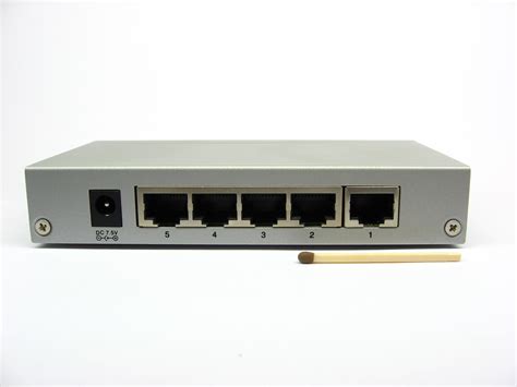 File:LAN switch - back, 5 ports (port 1 as uplink).jpg - Wikimedia Commons