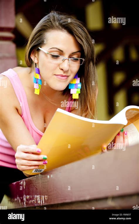 Young High School Student Or College Girl Sit And Learn On The Terrace