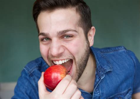 Find & download the most popular free stock photos on freepik free for commercial use high resolution images made for creative projects. Healthy Young Man Eating Apple Stock Photo - Download ...