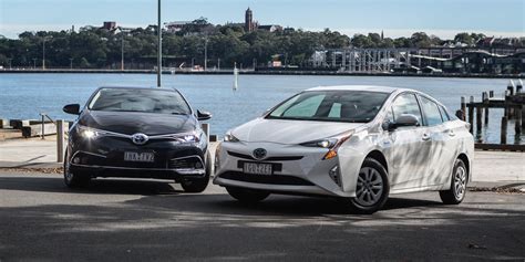 Toyota Corolla Hybrid V Toyota Prius Comparison Photos