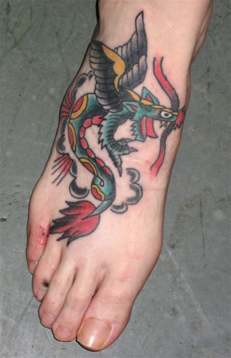 The foot gives a nice flat spot for your tattoo to lie. Blessing of God Tattoo: Foot Tattoos For Men