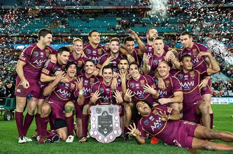 Queensland Maroons Celebrating With The 2013 State Of Origin Shield