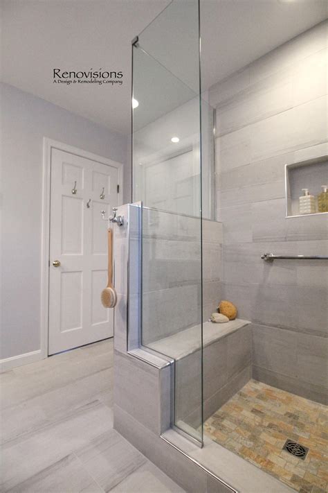 A Completed Master Bathroom Remodel By Renovisions Walk In Shower Shower Seat Shower Cubby