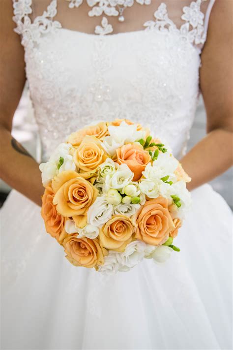 The image is available for download in high resolution quality up to 4744x2955. Person Holding Bouquet of Flower · Free Stock Photo