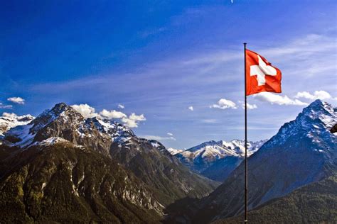 The swiss flag is a square with a cross in the center. switzerland flag image