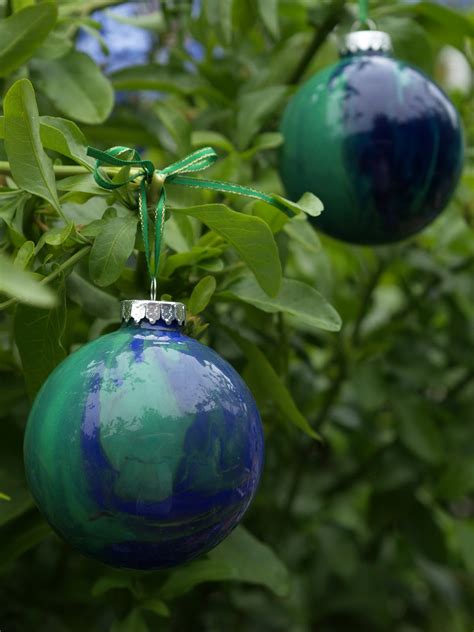 Each of these 20+ christmas a plain glass globe ornament is the base for this mythical unicorn christmas ornament. Glass Christmas Ornaments Pictures & Photos