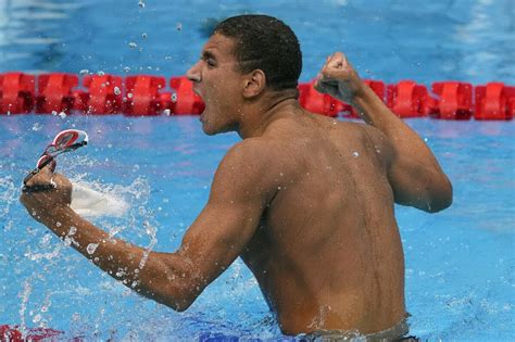 tunisian teen wins surprise olympic swimming gold ap news
