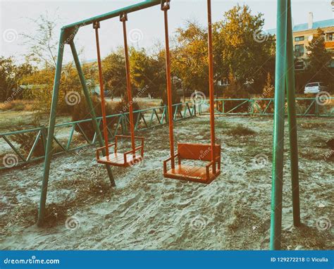 Empty Colorful Swing Set In Playground In Park Stock Photo Image Of