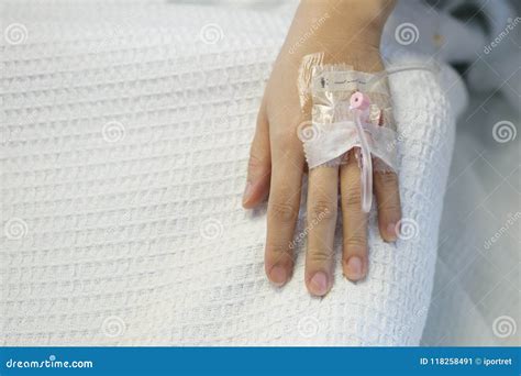 Hand Of Hospitalized Patient Inserted With Intravenous Drip Stock Image