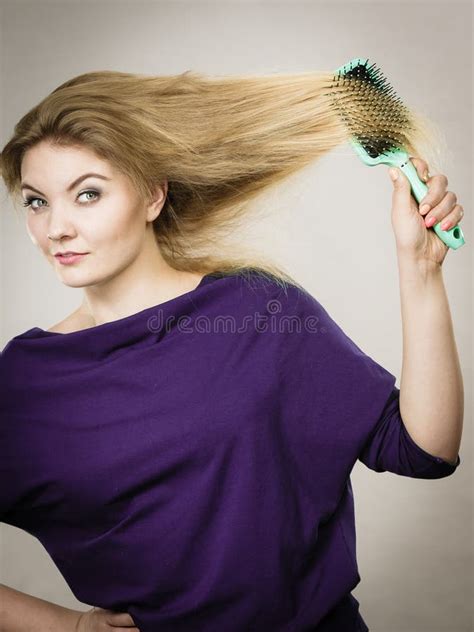 Woman Brushing Her Long Hair With Brush Stock Photo Image Of Comb