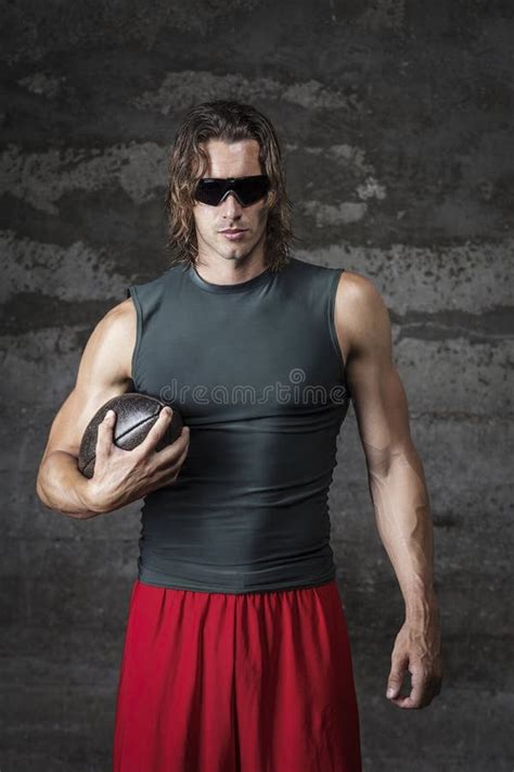 Muscle Man Is Holding Football Ball Stock Image Image Of Muscolar