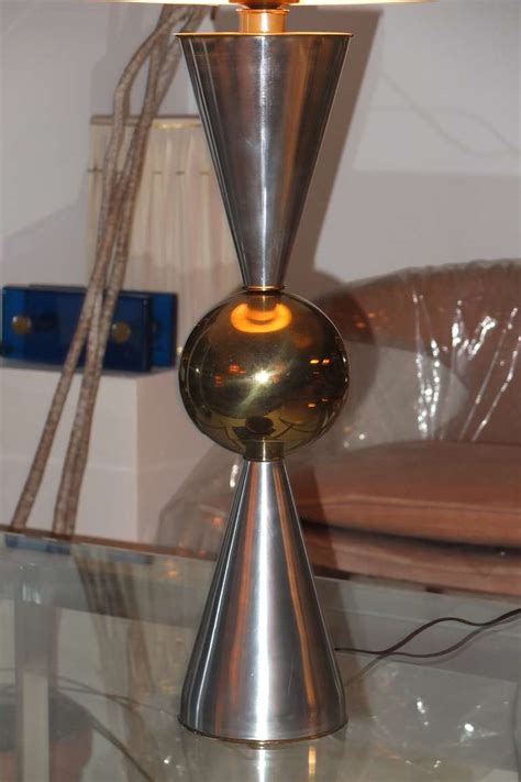 The lamp is made with extreme attention to detail. Atomic Double Cone and Ball Table Lamp For Sale at 1stdibs