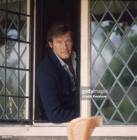 Sir Roger Moore Photos And Premium High Res Pictures Getty Images