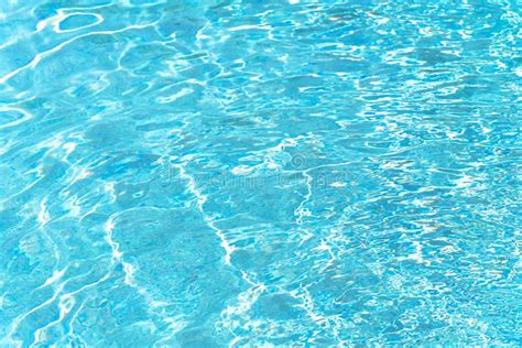 Blue Rippled Water In Swimming Pool On Sunny Summer Day Stock Image Image Of Shiny Bokeh