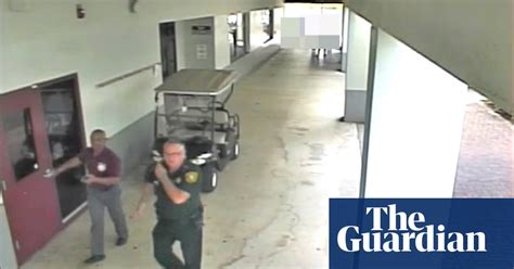 Surveillance Video Shows Armed Deputy Standing Outside During Florida