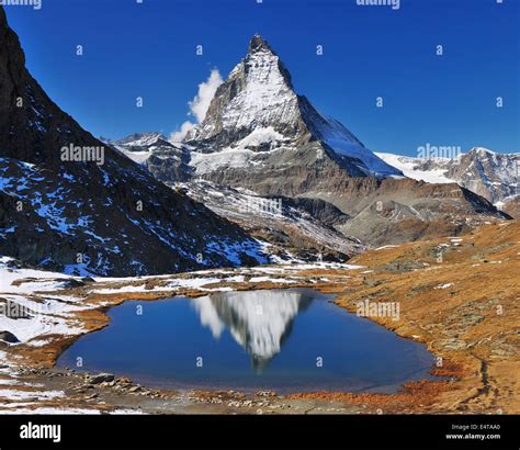 Matterhorn Reflected In Lake Riffelsee Zermatt Alps Valais