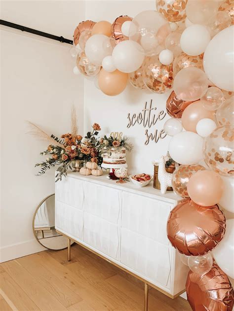 Rose Gold Peach Balloon Arch With Florals For Scottie Sues First