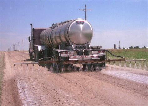 Dust tracks on the road. Calcium Chloride - DKD Trucking