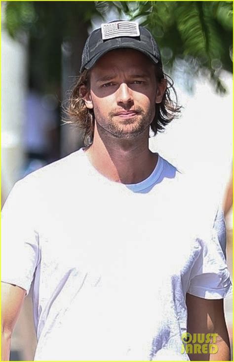 Patrick Schwarzenegger Cradles Adorable Puppy In His Arms After Lunch