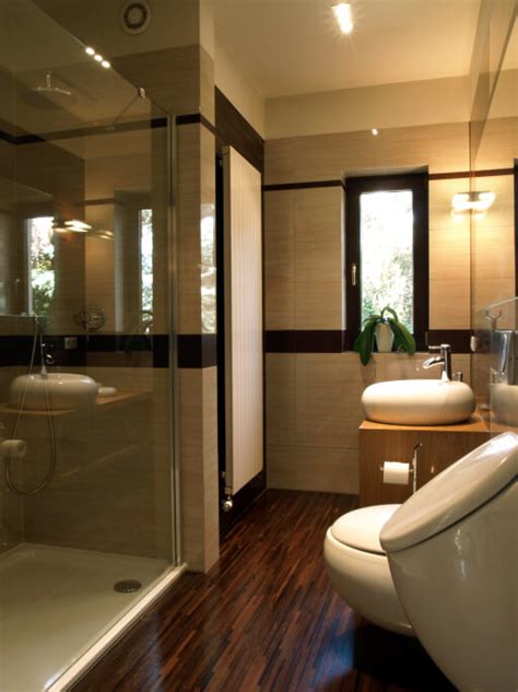 Wood slats in a wet room bath. 32 Bathrooms with Dark Floors