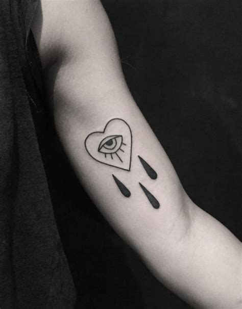 Crying Heart Tattoo Inkstylemag Crying Heart Tattoo Heart Tattoo