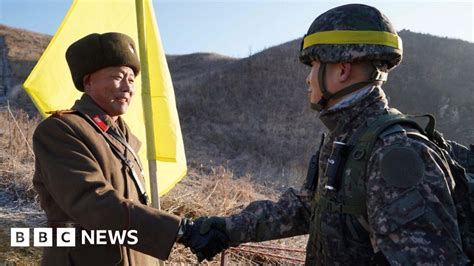 North And South Korea Soldiers Cross Dmz In Peace