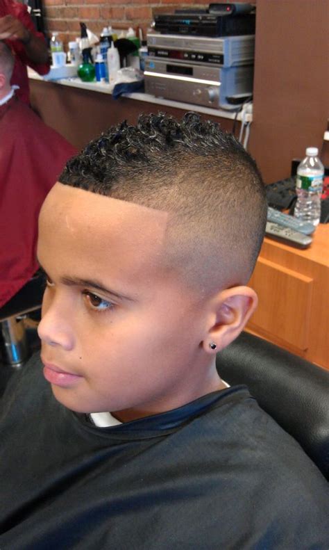 Use your hands instead of a brush when hair is dry. Fade Haircut for Black Men, High and Low Afro Fade Haircut (April 2021)