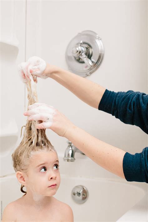 Girl Washing Her Hair In Bubble Bath Del Colaborador De Stocksy Brian Powell Stocksy