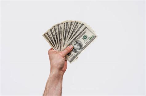 Hands Holding Money Stock Photos Pictures And Royalty Free Images Istock