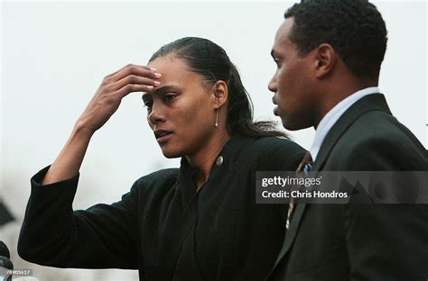 Marion Jones Stands With Her Husband Obadele Thompson After She News Photo Getty Images