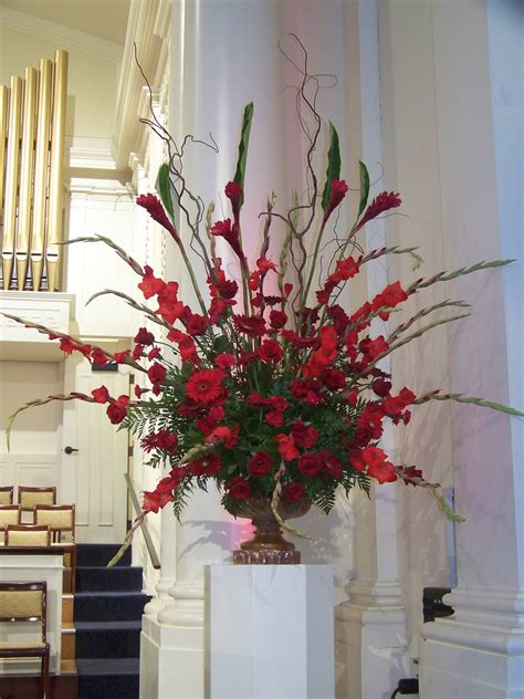 Simple wedding altar flower arrangement. Pentecost | Red flower arrangements, Large flower ...