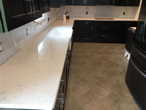 This White Cambria Quartz Countertop Makes A Bold Statement Against The