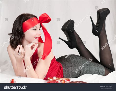 Beautiful Pin Up Girl Portrait Looking At Feet Stock Photo