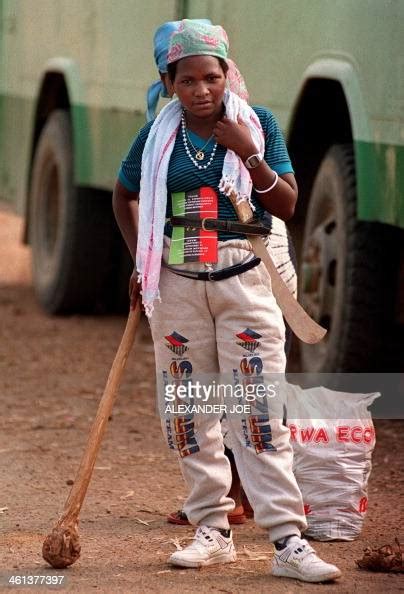 A Hutu Woman Of The Pro Government Militia Stands 12 June 1994 News Photo Getty Images