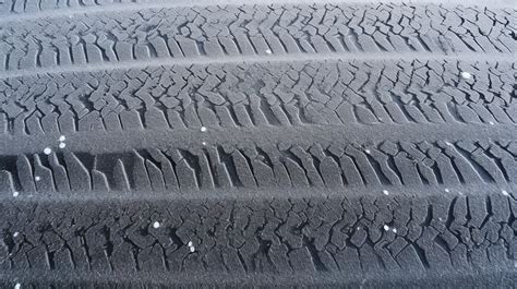 Snowy Asphalt Texture With Tire Prints As Background Minimal Texture