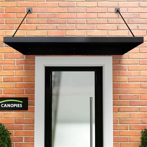 It has no official name so it is also known as an articulated canopy, bubble canopy, cockpit canopy, canopy door, or simply a canopy. Metal Door Canopy - DDA Compliant