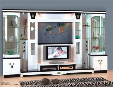 From paintings, vases, candles, indoor planters, your showcase can be used to display all of this and become the cynosure of your hall interiors. Furniture Design TV and Its Wonderful Complements ...