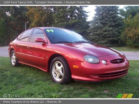 Toreador Red Metallic 1999 Ford Taurus Sho Medium Prairie Tan