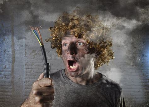 Electrocuted Man With Cable Smoking After Domestic Accident With Dirty