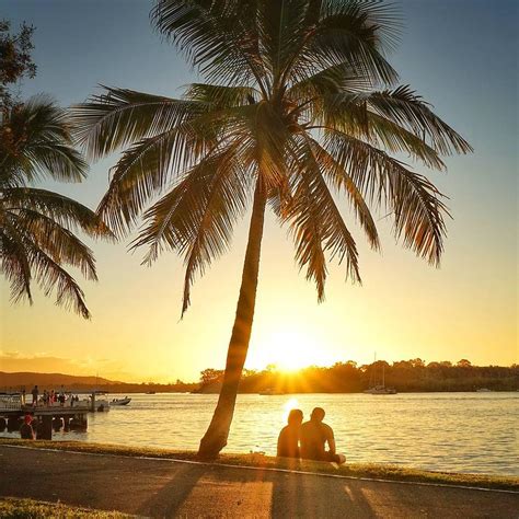 Sunset Lovers Under Palm Tree And Down By The River Photograph By