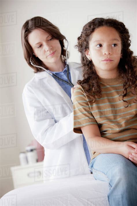 Doctor Examining Girl 8 9 Stock Photo Dissolve
